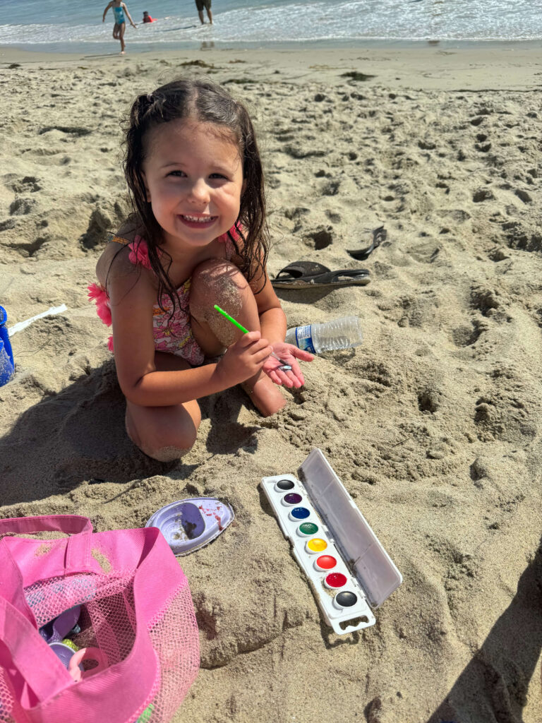 Kids playing in the sand at Laguna Beach